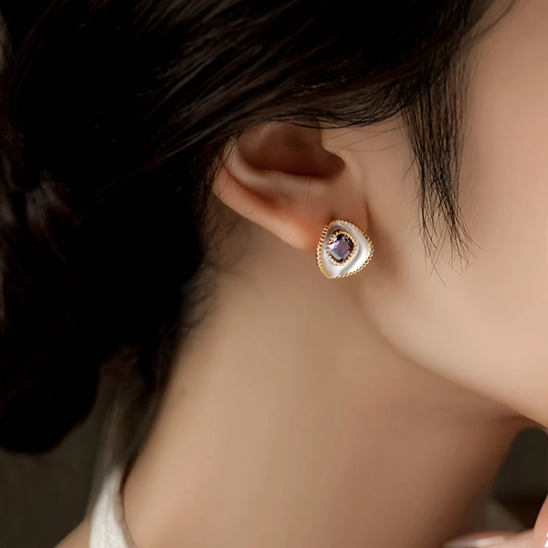 Close-up detail of the sparkling zircons and plating on the Purple Diamond Studs