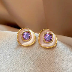 Angled view of the 14K Gold-Plated Elegant Purple Diamond Stud Earrings