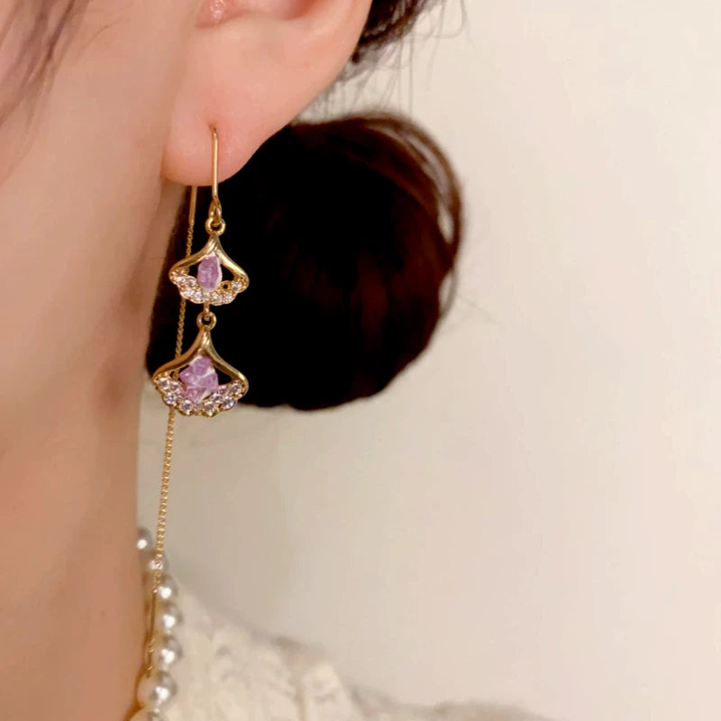 Close-up detail of the sparkling zircons and plating on the Ginkgo Leaf Threader Earrings