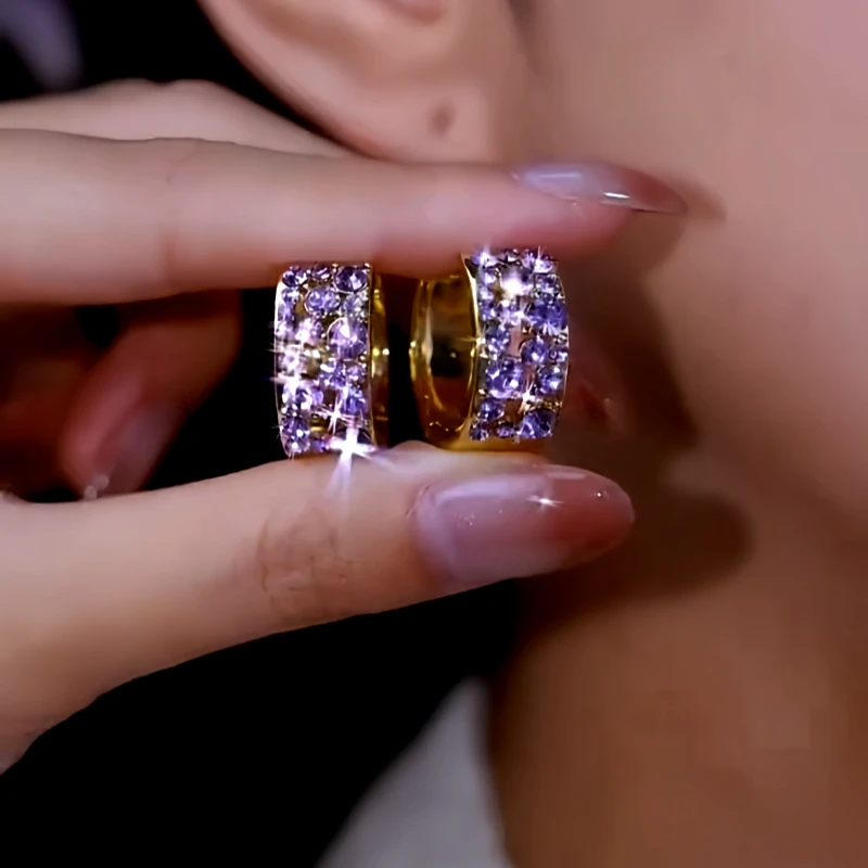 Close-up detail of the sparkling zircons and plating on the Purple Zircon Hoop Earrings