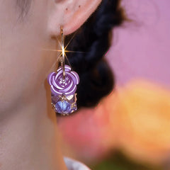 Close-up detail of the sparkling zircons and plating on the Purple Zircon Flower Earrings