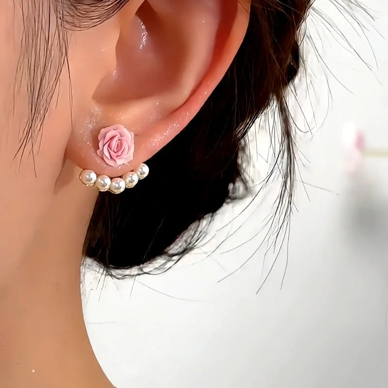Angled view of the 14K Gold-Plated Elegant Red And Pink Rose Pearl Jacket Earrings