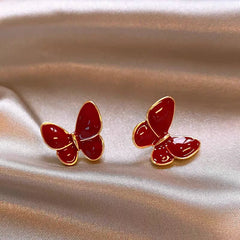 Angled view of the 14K Gold-Plated Elegant Red Butterfly Earrings