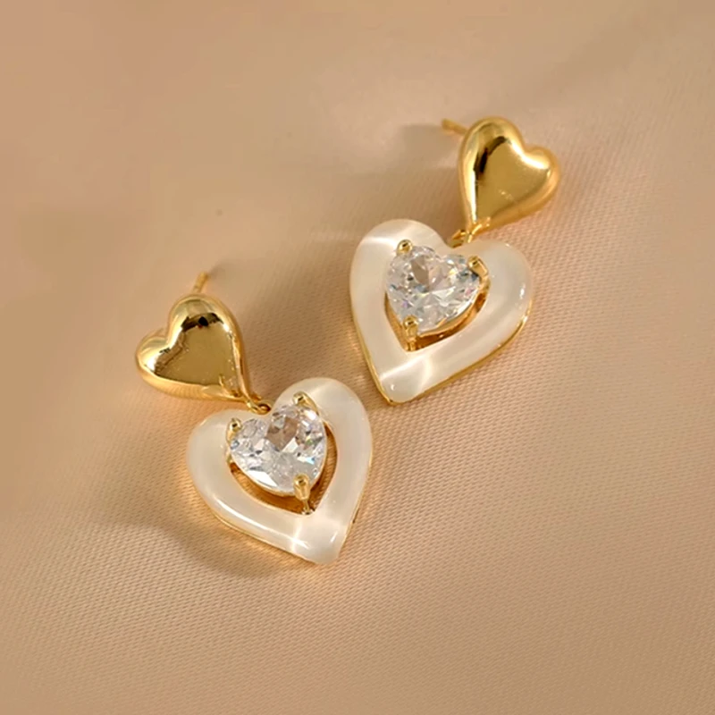 Close-up detail of the sparkling zircons and plating on the Rhinestone Heart Earrings