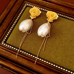 Close-up detail of the sparkling zircons and plating on the Rose Pearl Earrings