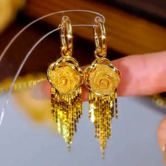 Close-up detail of the sparkling zircons and plating on the Rose Tassel Earrings