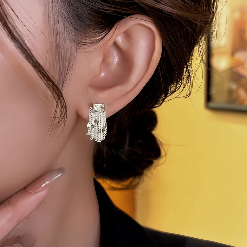 Close-up detail of the sparkling zircons and plating on the Sequin Tassel Earrings