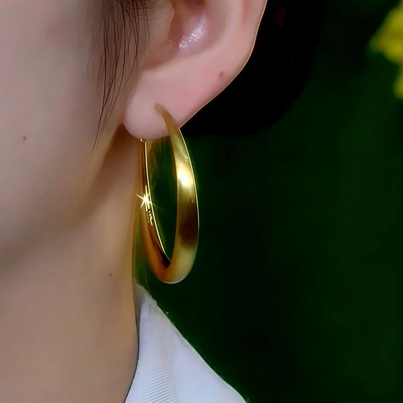 Close-up detail of the sparkling zircons and plating on the Big Hoop Earrings