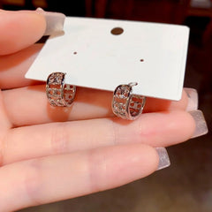 Angled view of the 14K Gold-Plated Elegant Small Hoop Earrings