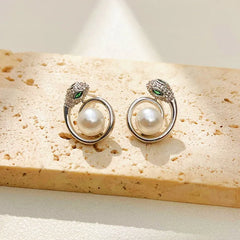 Styling the Snake Pearl Earrings for a chic and modern look