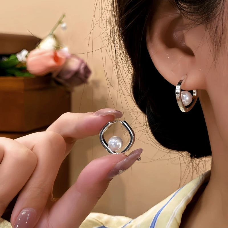 Angled view of the 14K Gold-Plated Elegant Square Bead Earrings