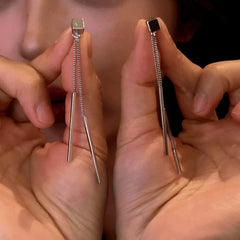 Angled view of the 14K Gold-Plated Elegant Square Tassel Earrings