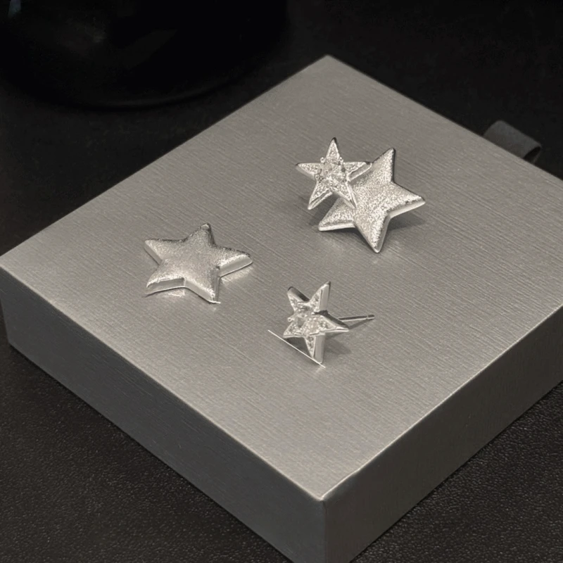 Close-up detail of the sparkling zircons and plating on the Star Jacket Earrings