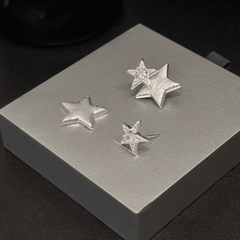 Close-up detail of the sparkling zircons and plating on the Star Jacket Earrings