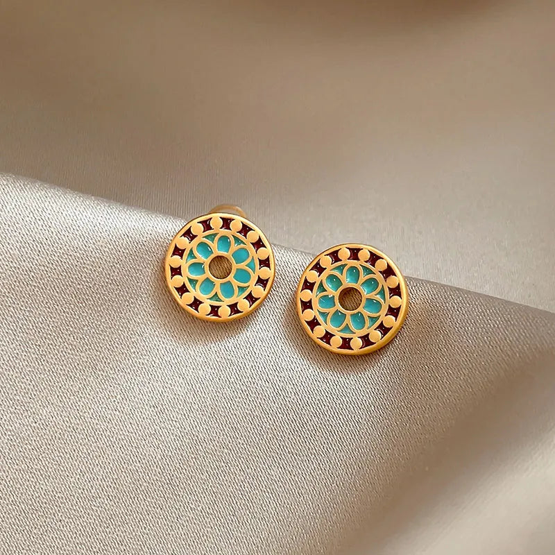 Close-up detail of the sparkling zircons and plating on the Blue Gold Studs