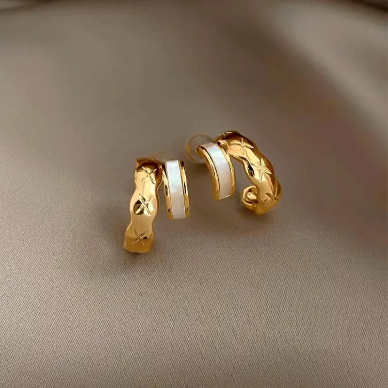 Close-up detail of the sparkling zircons and plating on the Elegant Gold Studs