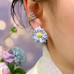 Close-up detail of the sparkling zircons and plating on the Sunflower Stud Earrings