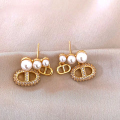 Angled view of the 14K Gold-Plated Elegant Sweet Pearl Tassel Earrings