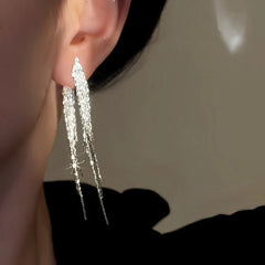 Close-up detail of the sparkling zircons and plating on the Long Tassel Earrings