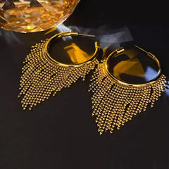 Angled view of the 14K Gold-Plated Elegant Tassel Earrings