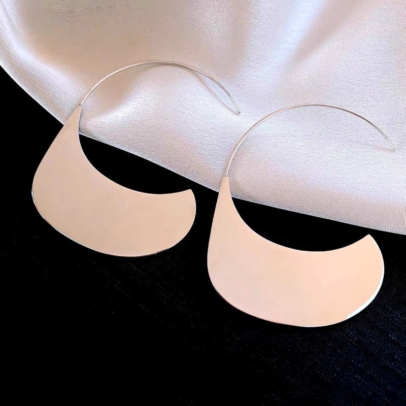 Close-up detail of the sparkling zircons and plating on the Minimalist Threader Earrings