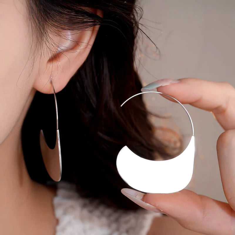 Model showcasing the dangle and style of the 14K Gold-Plated Elegant Threader Earrings