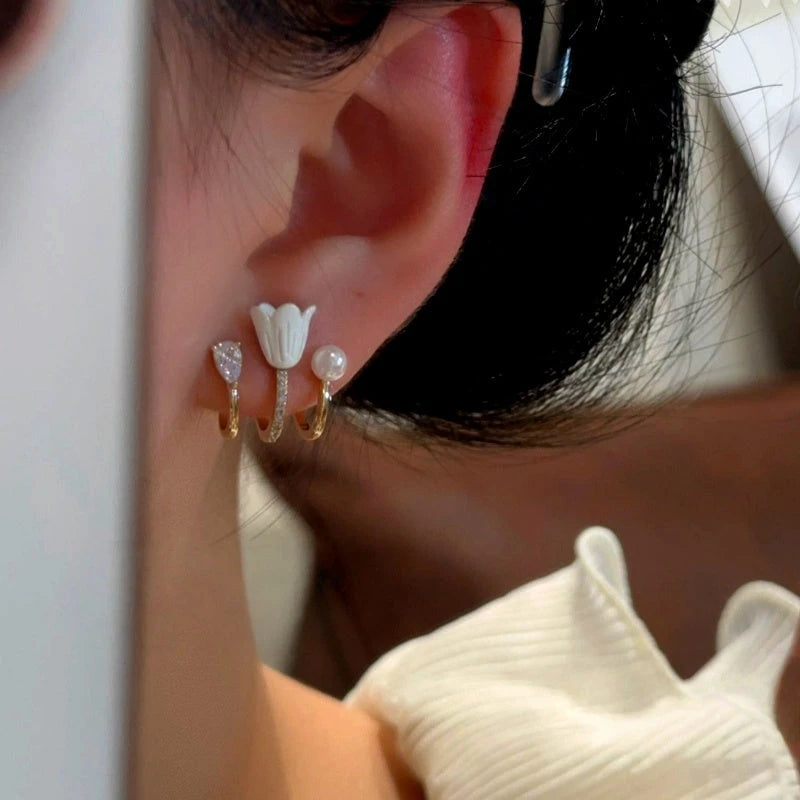 Close-up detail of the sparkling zircons and plating on the Tulip Studs