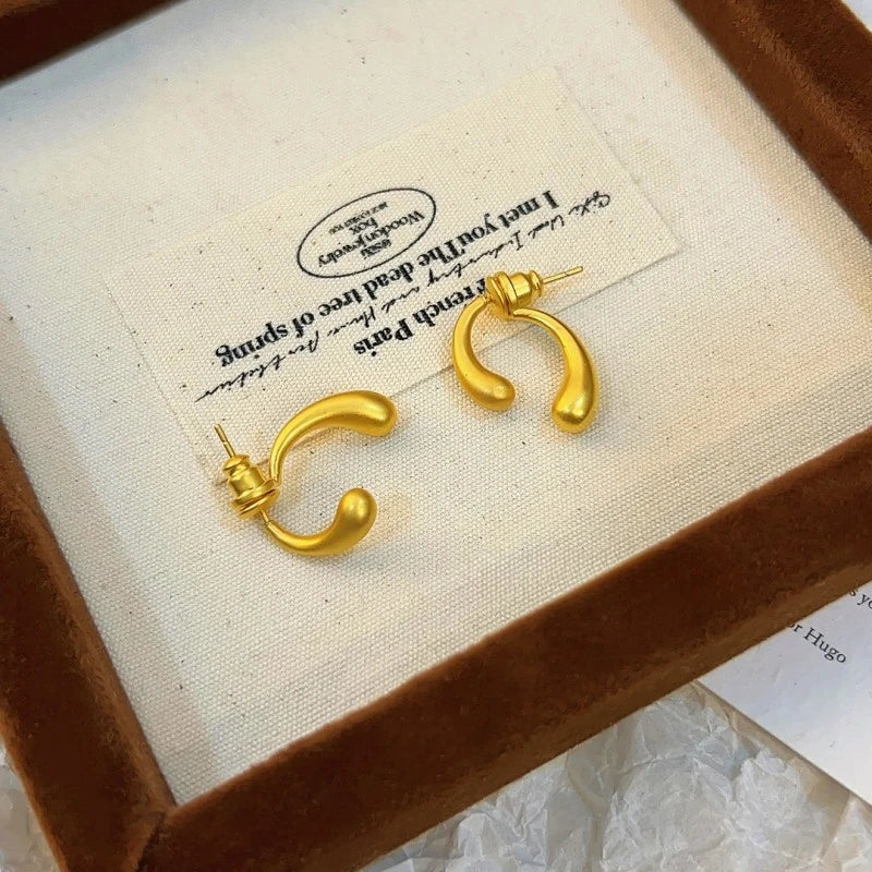 Angled view of the 14K Gold-Plated Elegant Two-Pieces Water Drop Earrings