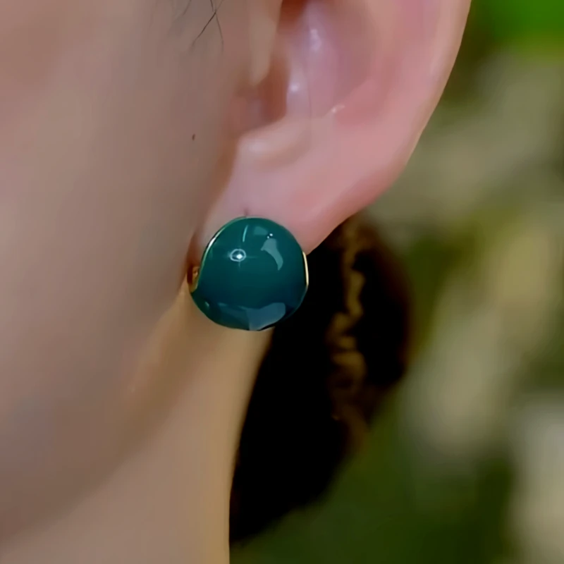 Close-up detail of the sparkling zircons and plating on the Blue Water Drop Earrings