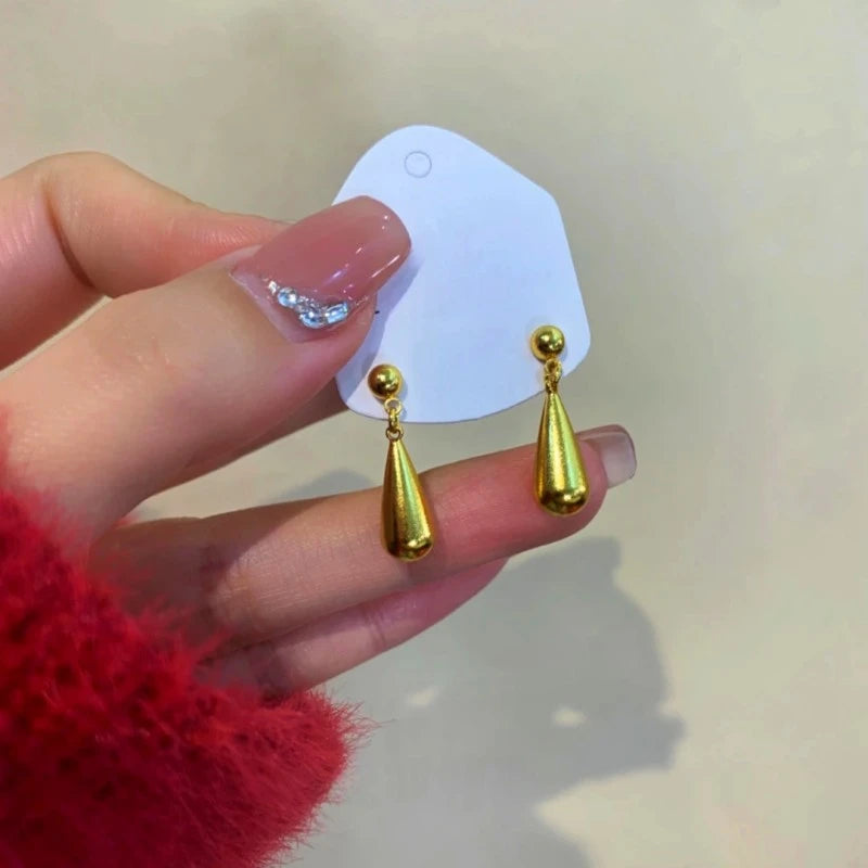 Angled view of the 14K Gold-Plated Elegant Water Drop Earrings