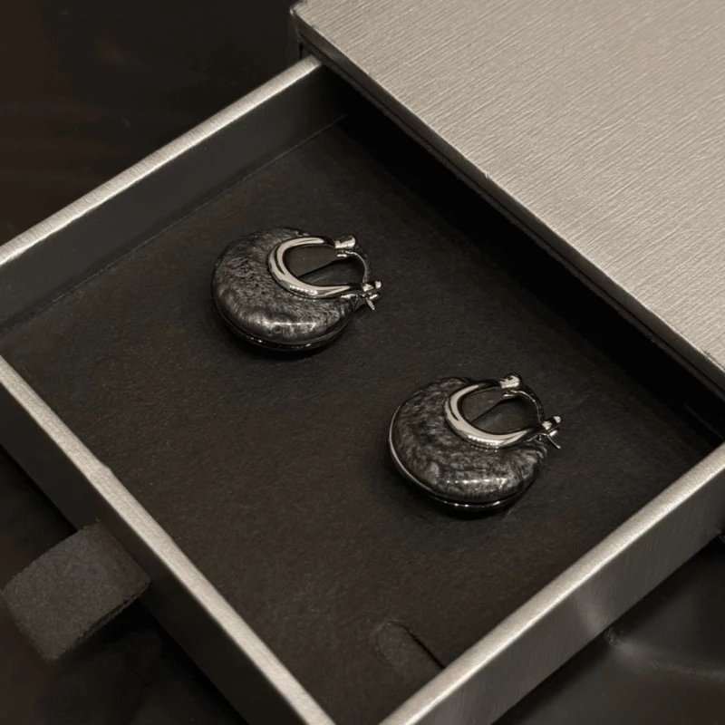 Angled view of the 14K Gold-Plated Elegant Water Drop Earrings