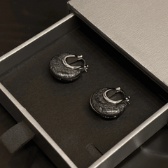 Angled view of the 14K Gold-Plated Elegant Water Drop Earrings