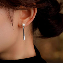 Close-up detail of the sparkling zircons and plating on the Pearl Drop Earrings