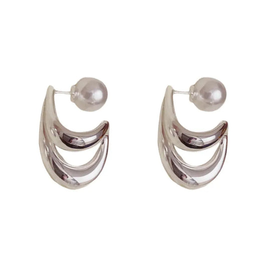 Model showcasing the dangle and style of the 14K Gold-Plated Elegant Water Drop Pearl Earrings