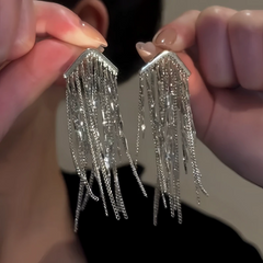 Close-up detail of the sparkling zircons and plating on the Waterfall Tassel Earrings