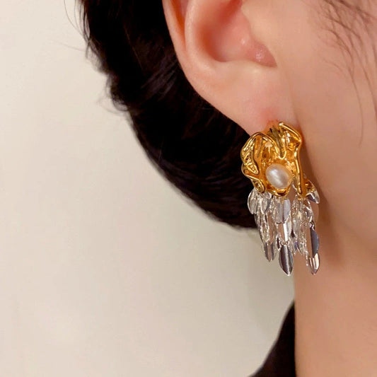 Model showcasing the dangle and style of the 14K Gold-Plated Elegant Wheat Tassel Earrings