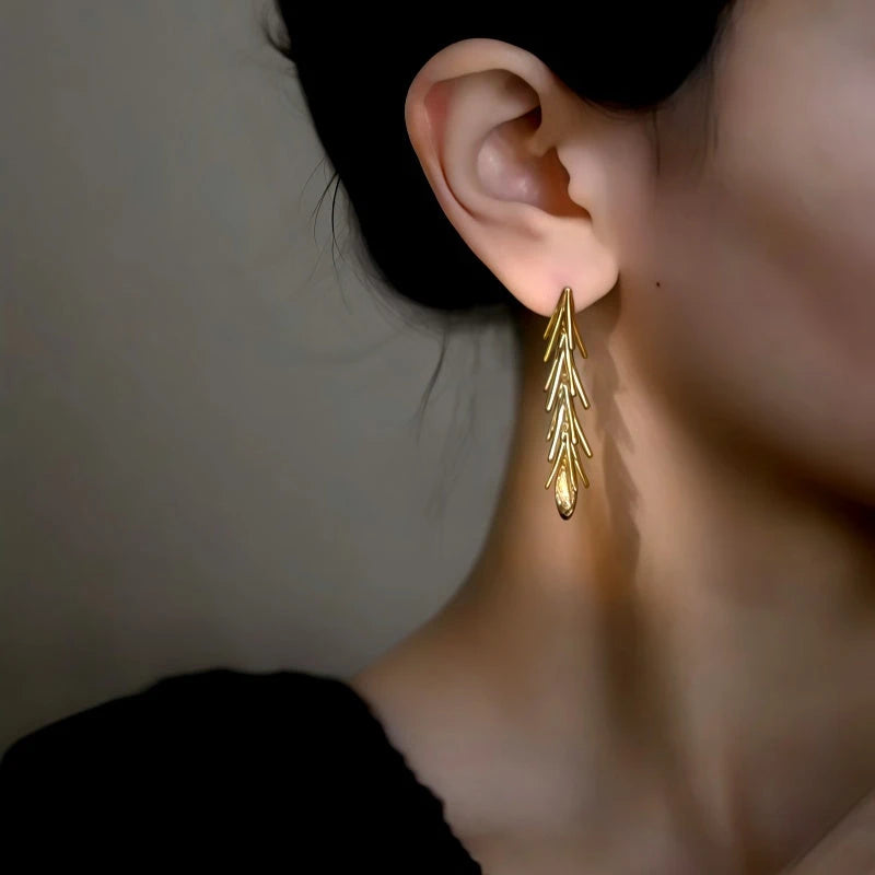 Close-up detail of the sparkling zircons and plating on the Wheat Tassel Earrings