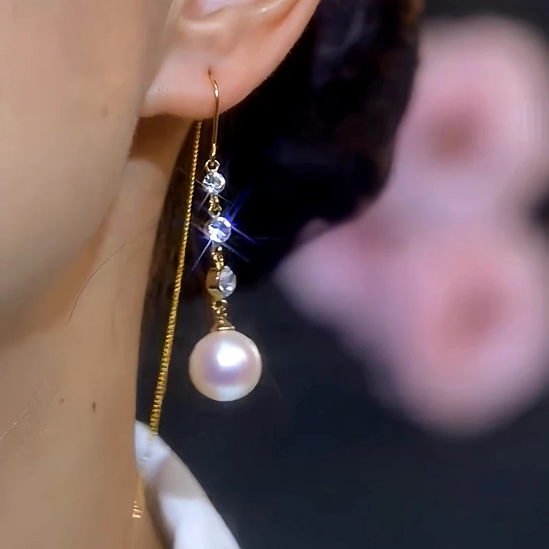 Close-up detail of the sparkling zircons and plating on the Pearl Threader Earrings