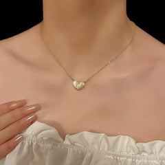 Detailed view of the 14K Gold-Plated Elegant White Shell Heart Magnetic Necklace chain and pendant