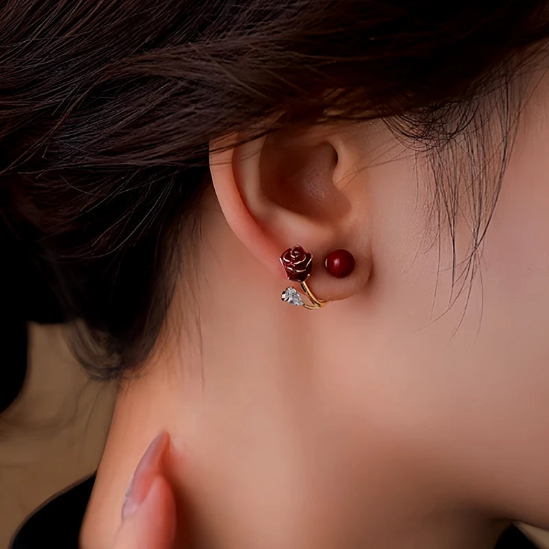 Close-up detail of the sparkling zircons and plating on the Red Rose Earrings