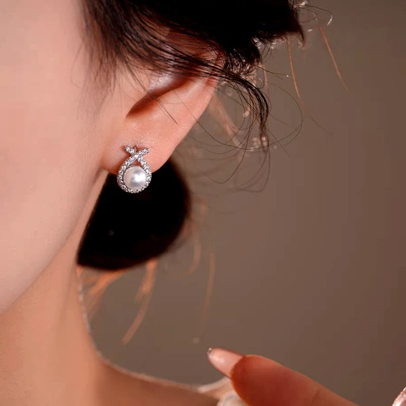 Close-up detail of the sparkling zircons and plating on the Water Drop Hoops