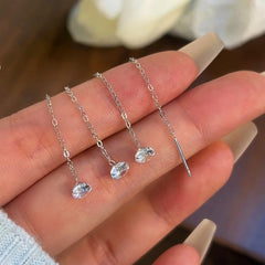 Angled view of the 14K Gold-Plated Elegant Zircon Bean Threader Earrings