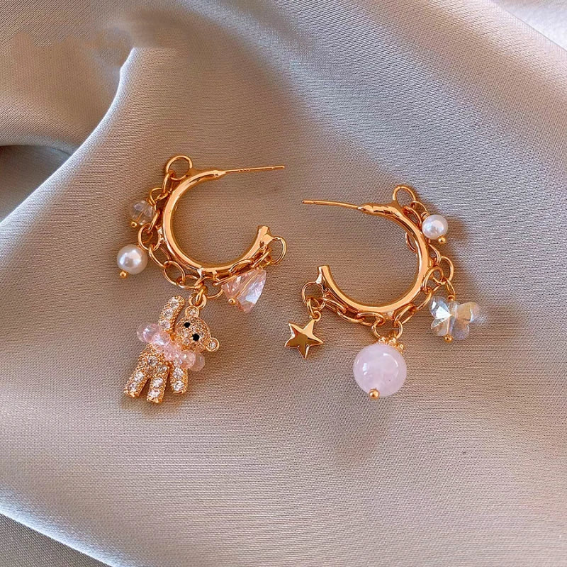 Close-up detail of the sparkling zircons and plating on the Bear Tassel Earrings