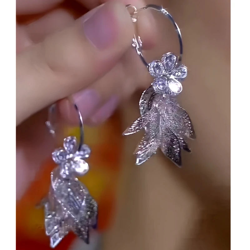 Close-up detail of the sparkling zircons and plating on the Flower Tassel Earrings