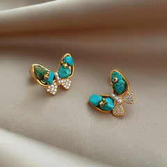 Angled view of the 14K Gold-Plated Elegant Zircon Green Butterfly Stud Earrings