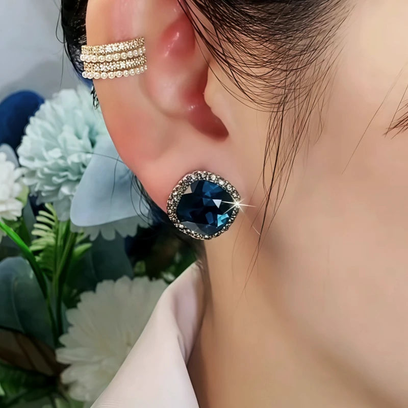Close-up detail of the sparkling zircons and plating on the Blue Crystal Studs