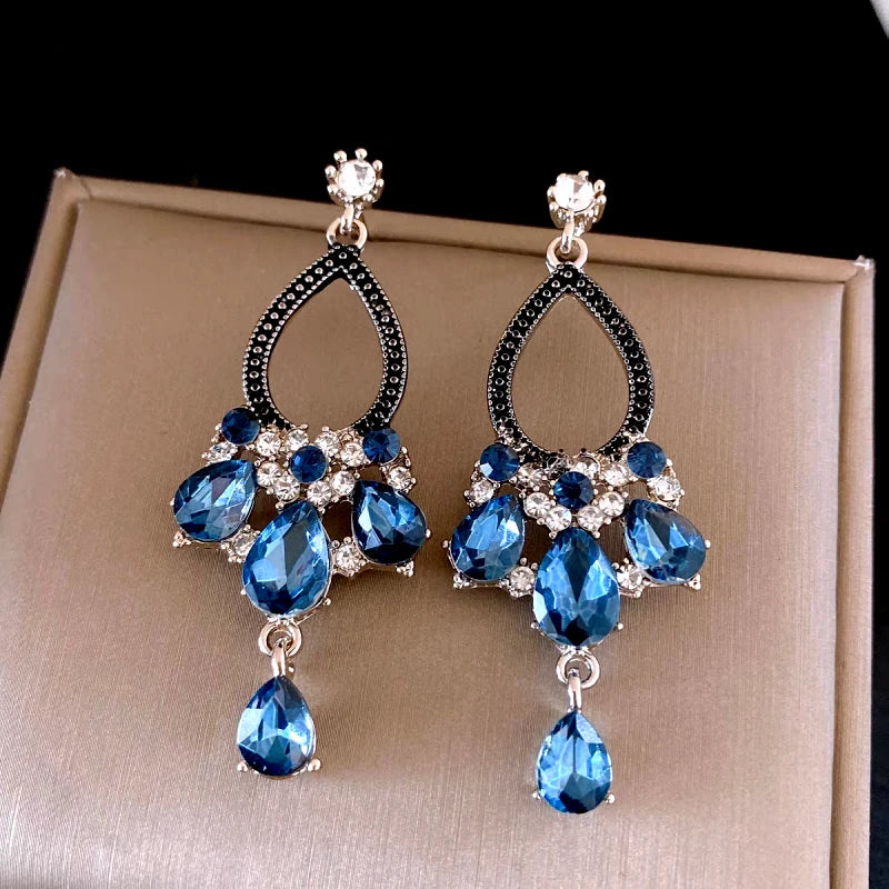 Close-up detail of the sparkling zircons and plating on the Blue Tassel Earrings