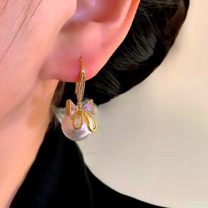 Styling the Bow Ear Hooks for a chic and modern look