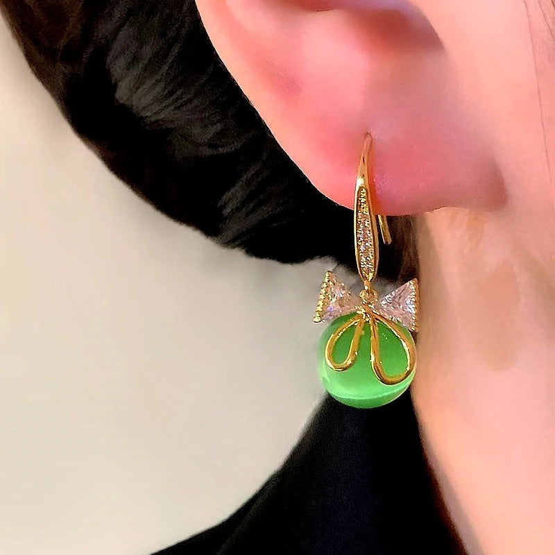 Close-up detail of the sparkling zircons and plating on the Bow Ear Hooks