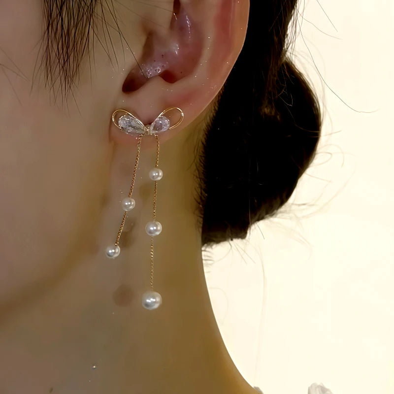 Close-up detail of the sparkling zircons and plating on the Pearl Tassel Earrings